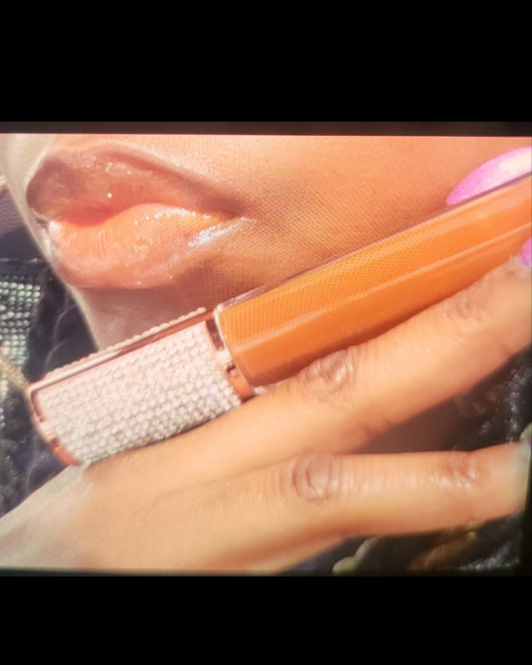 Adia Golden Sun Magic lip gloss.